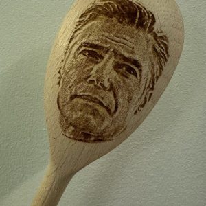 Collectible Wooden Spoon with Anson Mount's Face - A Must-Have for Sci-Fi Lovers!